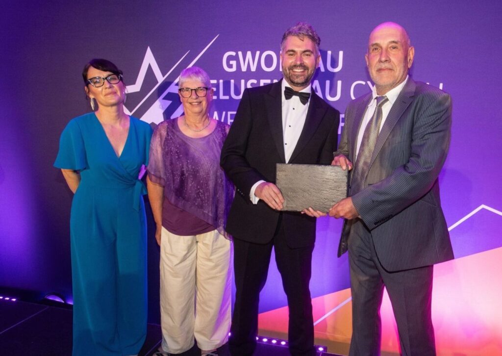 Marco being handed his award