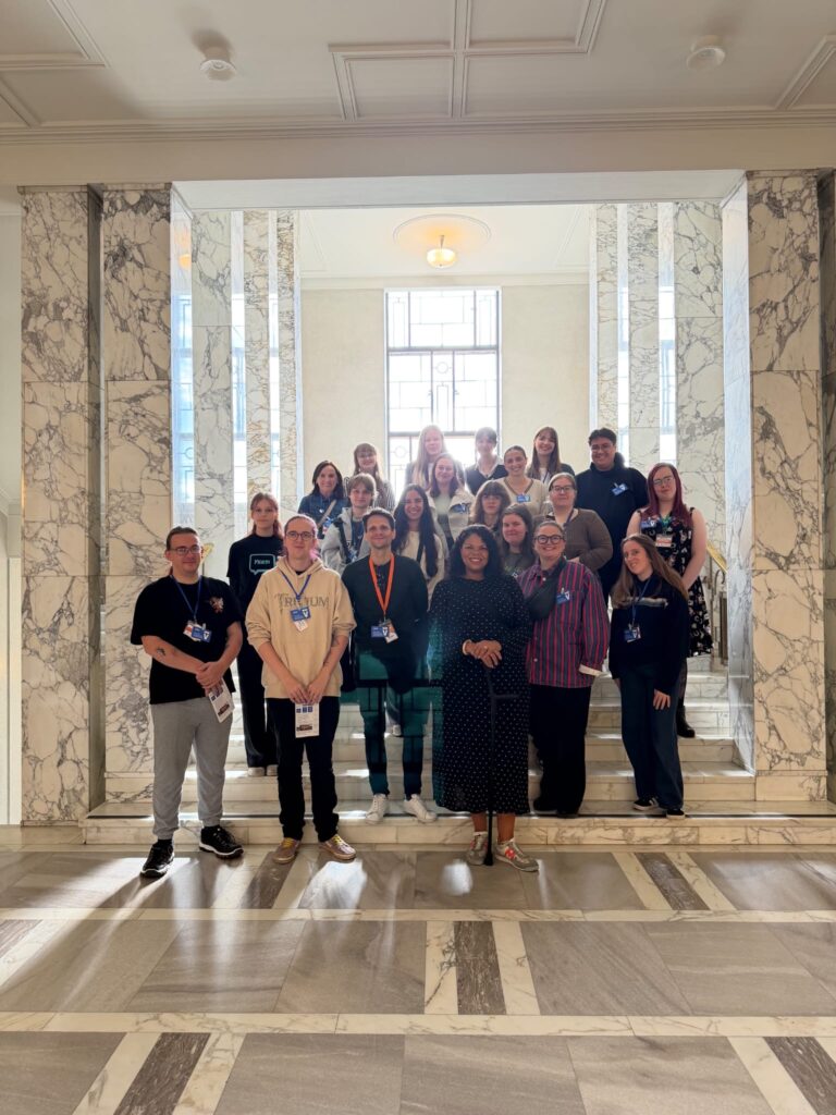 Group photo of all the peer service designers in the parliament